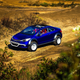 Illustration for article titled The Kia Forte Koup Mud Bogger Concept Is Badass Even If Its Two-Wheel Drive